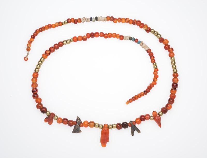 Necklace of beads and amulets