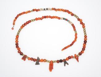 Necklace of beads and amulets