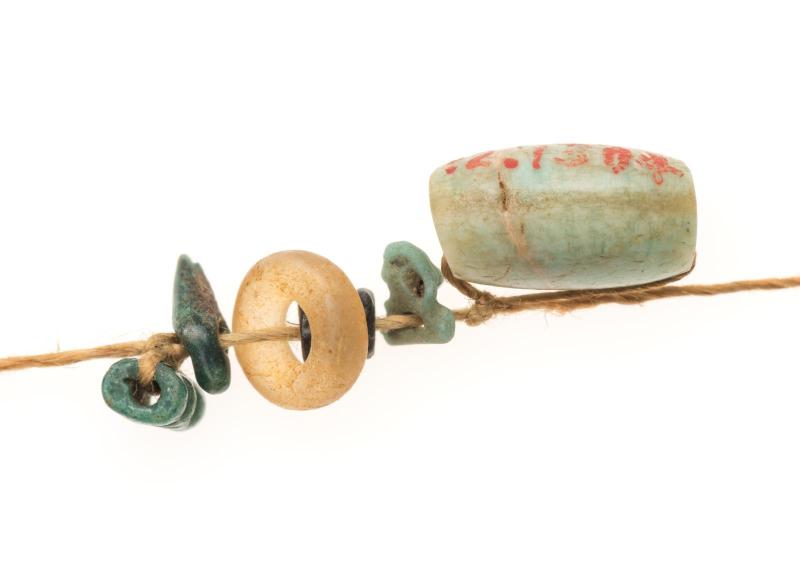 String of beads and amulets