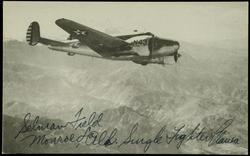 Snowy slopes of the Rocky Mountains are the textbook for a group of navigation cadets on a routine training flight from the Army Air Forces Navigation School, Selman Field, La. Cadets in this twin-motored AT-7 navigation training ship may some future day guide a U.S. Flying Fortress on a bombing mission over uncharted enemy territory.