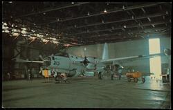 GN.2 - Lockheed SP-2E "Neptune" undergoing a periodic maintenance check in a hangar at Naval Air Station, Glenview, Illinois. The "Neptunes" are long-range anti-submarine warfare aircraft used from shore-based activities.