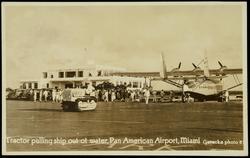 Tractor pulling ship out of water, Pan American Airport, Miami