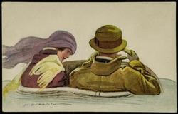 Man and woman driving in a convertible car.