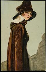 Woman wearing a brown coat and brown hat.
