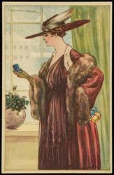 Woman staring at a ring in a jewelry box.