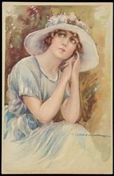 Portrait of a woman in a light blue dress and hat.
