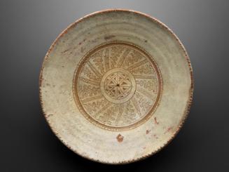 Glazed dish with geometric and scrollwork designs