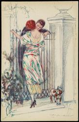 Man and woman kissing over a tall iron fence.