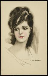 Fashion photo of a beautiful woman with swept up black hair.