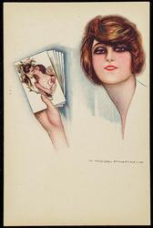 Woman looking at photos of a couple in a romantic embrace.