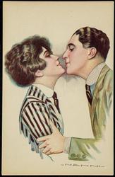 Man and woman embracing, wearing mens dress shirts and ties.