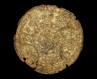 Disc of thin gold with decorations in repoussé