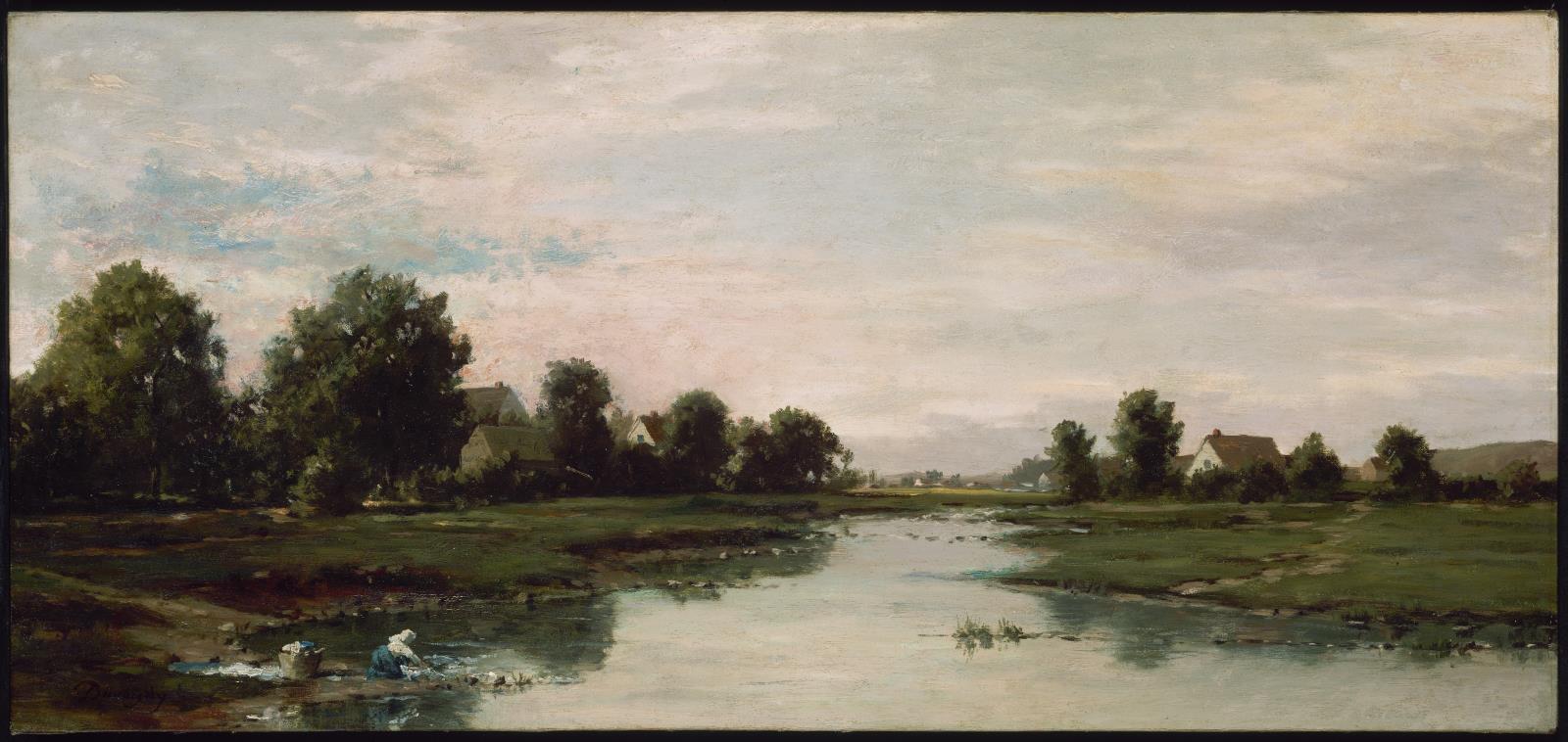 Woman Washing Clothes at the Edge of a River