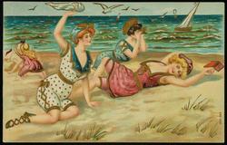 Three women and a girl at the beach.