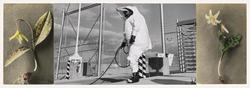 A worker in demilitarization protective ensemble (DPE) holding a chemical projectile at Tooele Chemical Disposal Facility; 36 acres; Toole, Utah