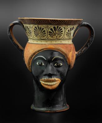High-handled drinking cup (kantharos) in the form of two female heads