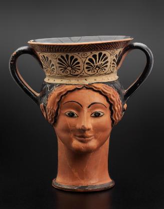 High-handled drinking cup (kantharos) in the form of two female heads