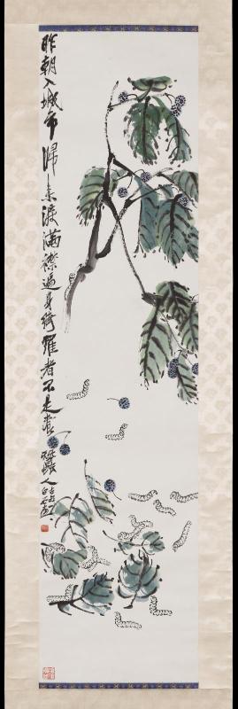 Silkworms eating mulberry leaves