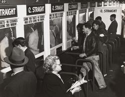 People placing bets on dog races at Wonderland track, Revere,
MA, 1948