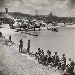 Untitled (planes and soldiers around water's edge), 1944