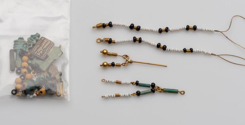 String of beads and amulets