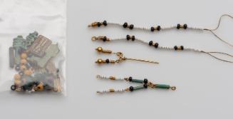 String of beads and amulets
