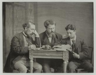 Untitled (three men around a table)