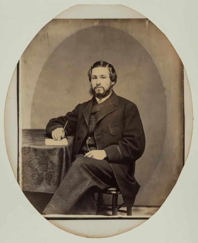 Portrait of a Man Seated at Table