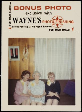 Three older women on sofa 