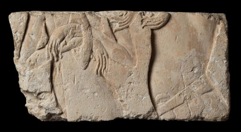 Fragmentary relief with two prisoners
