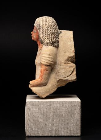 Fragmentary statue of a seated couple