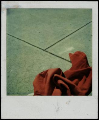 Red fabric on green surface