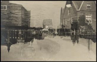 Double exposure of a waterfront town