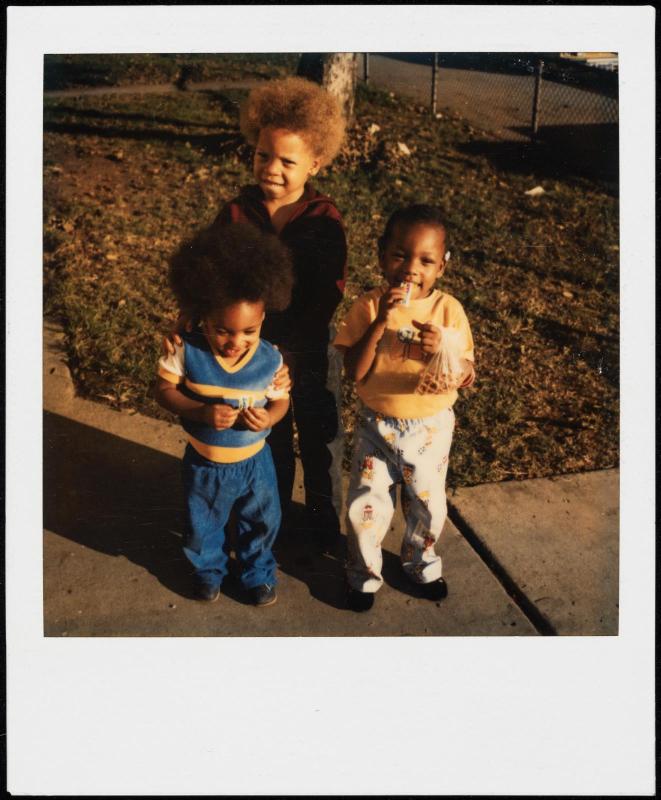 Portrait of three young children seen from slightly above