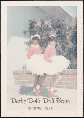 Darby Dolls Drill Team, portrait of two costumed girls