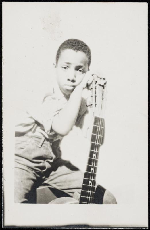Young boy with guitar