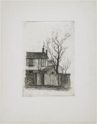Portion of house, with wall and bare tree
