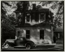 Untitled (Packard coupe in front of house)