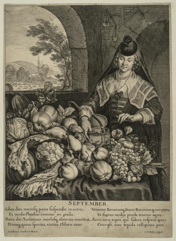"September"  Woman satnding at a table laden with fruit