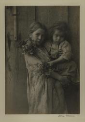 Untitled (two girls holding flowers)