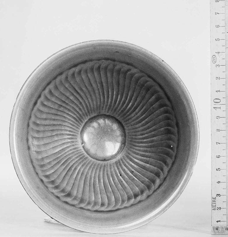 Conical bowl with molded design