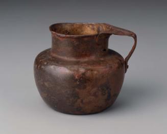 Jug with lotus handle
