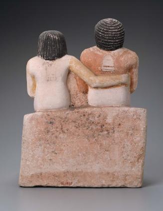 Seated pair statue