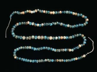 Blue-glazed quartz beads