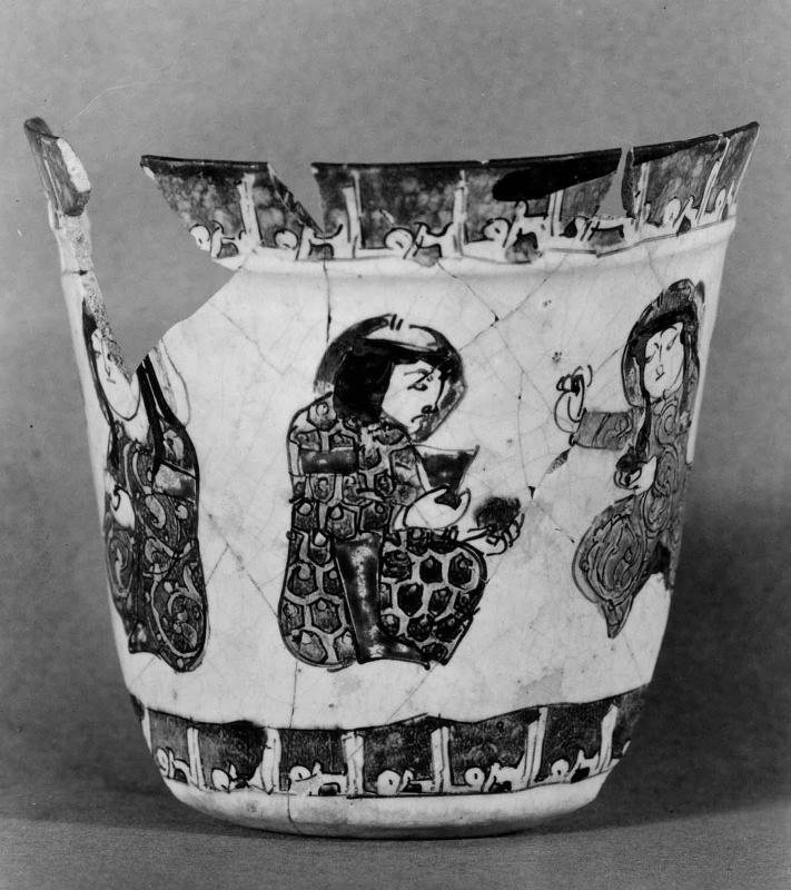 Beaker with figures
