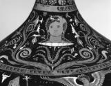 Head of Lo in a flowering vine