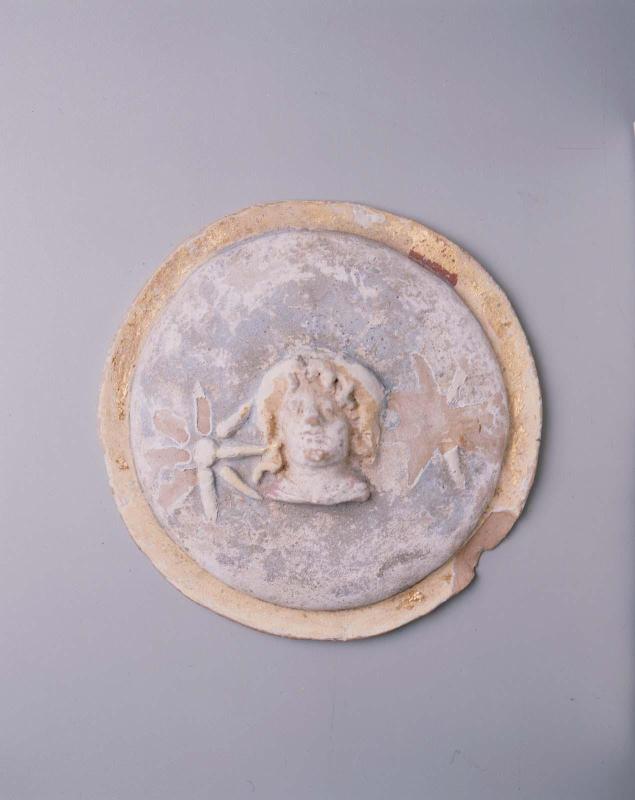 Shield with a head of a Dioskouros
