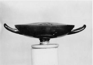 Covered drinking cup (kylix) depciting athletes and judges