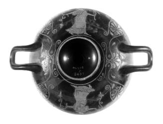 Covered drinking cup (kylix) with Apollo and a Muse