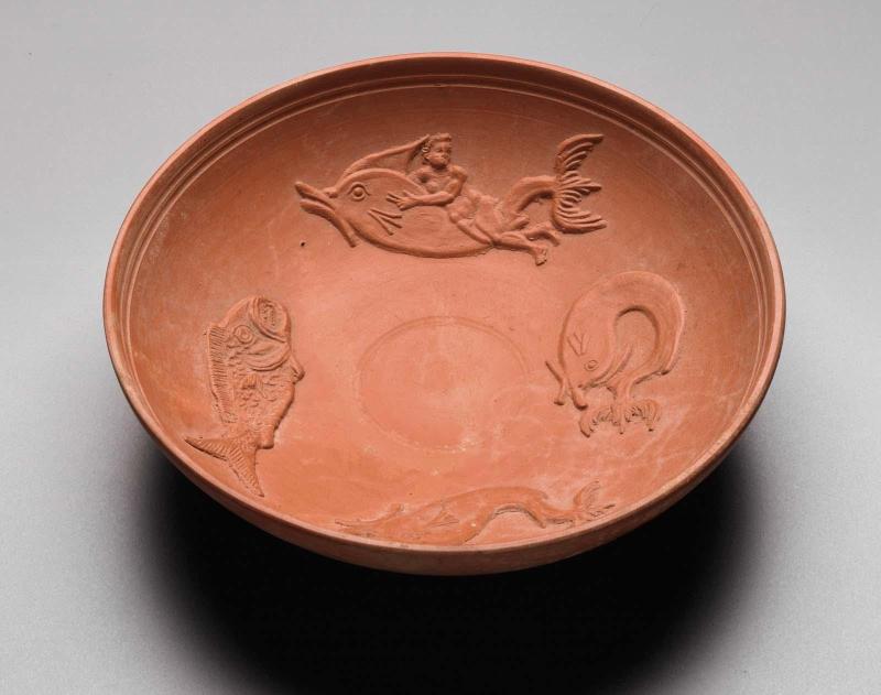 African red-slip bowl with a boy on a dolphin